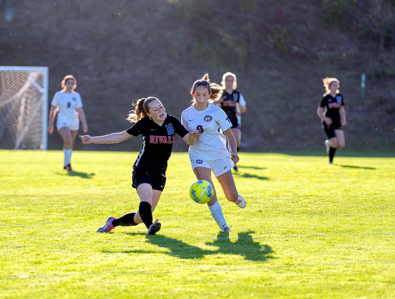 East Jefferson’s Fern French challenges Life Christian’s Lucia Roso for control during the first half of a game played on Thursday at Port Townsend’s Memorial Field.
Steve Mullensky/for Peninsula Daily News