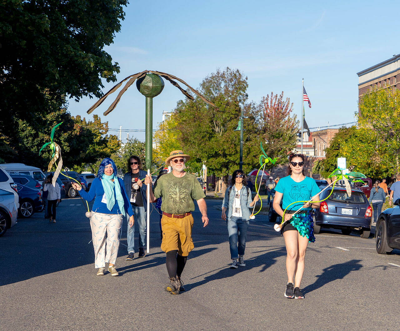 The Bull Kelp Brigade, a community group promoting awareness of ecology of the Salish Sea, marches on Washington Street during the Port Townsend Film Festival’s Filmmakers Parade on Friday. (Steve Mullensky/for Peninsula Daily News)