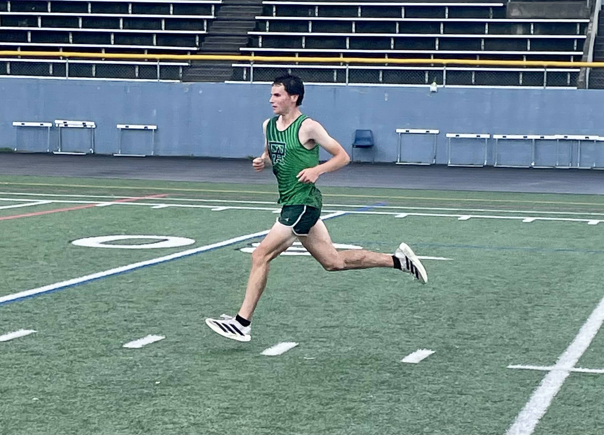 Port Angeles Cross Country
Port Angeles’ Andre Campbell finishes strong at the Olympic League Cross Country meet at North Mason High School on Wednesday.