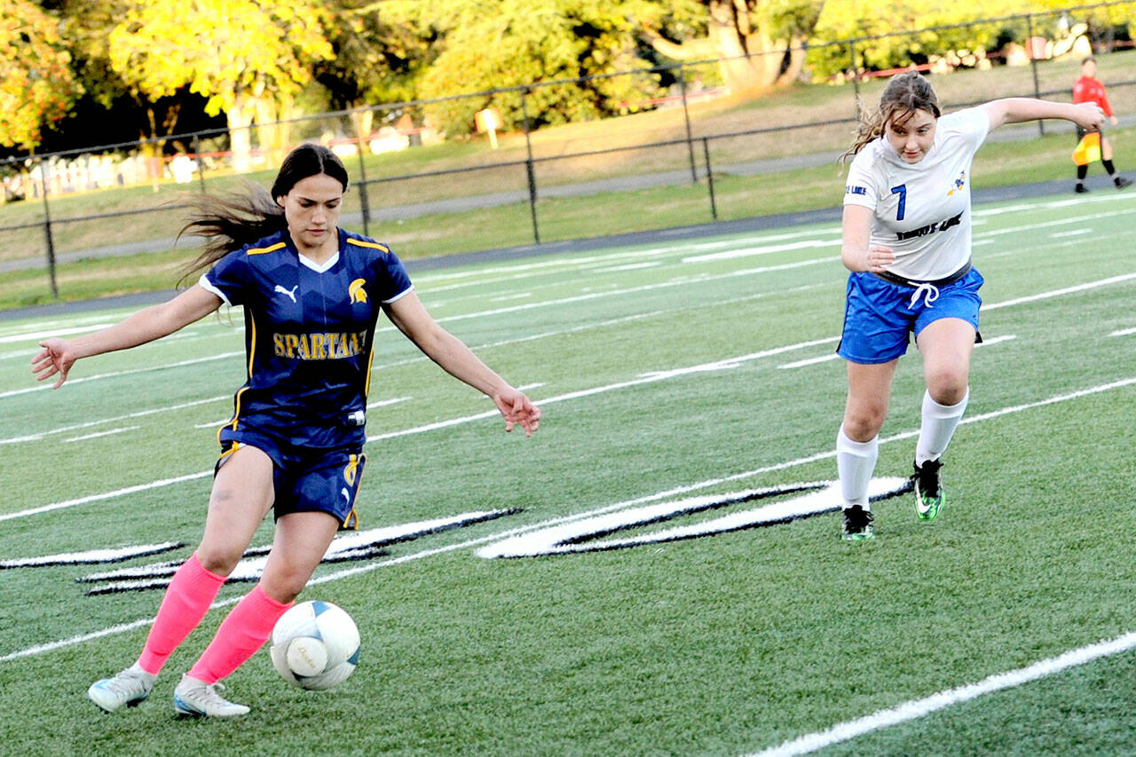 Forks’ Jade Blair controls the ball against Toutle Lake at Spartan Stadium on Wednesday. Lonnie Archibald/for Peninsula Daily News