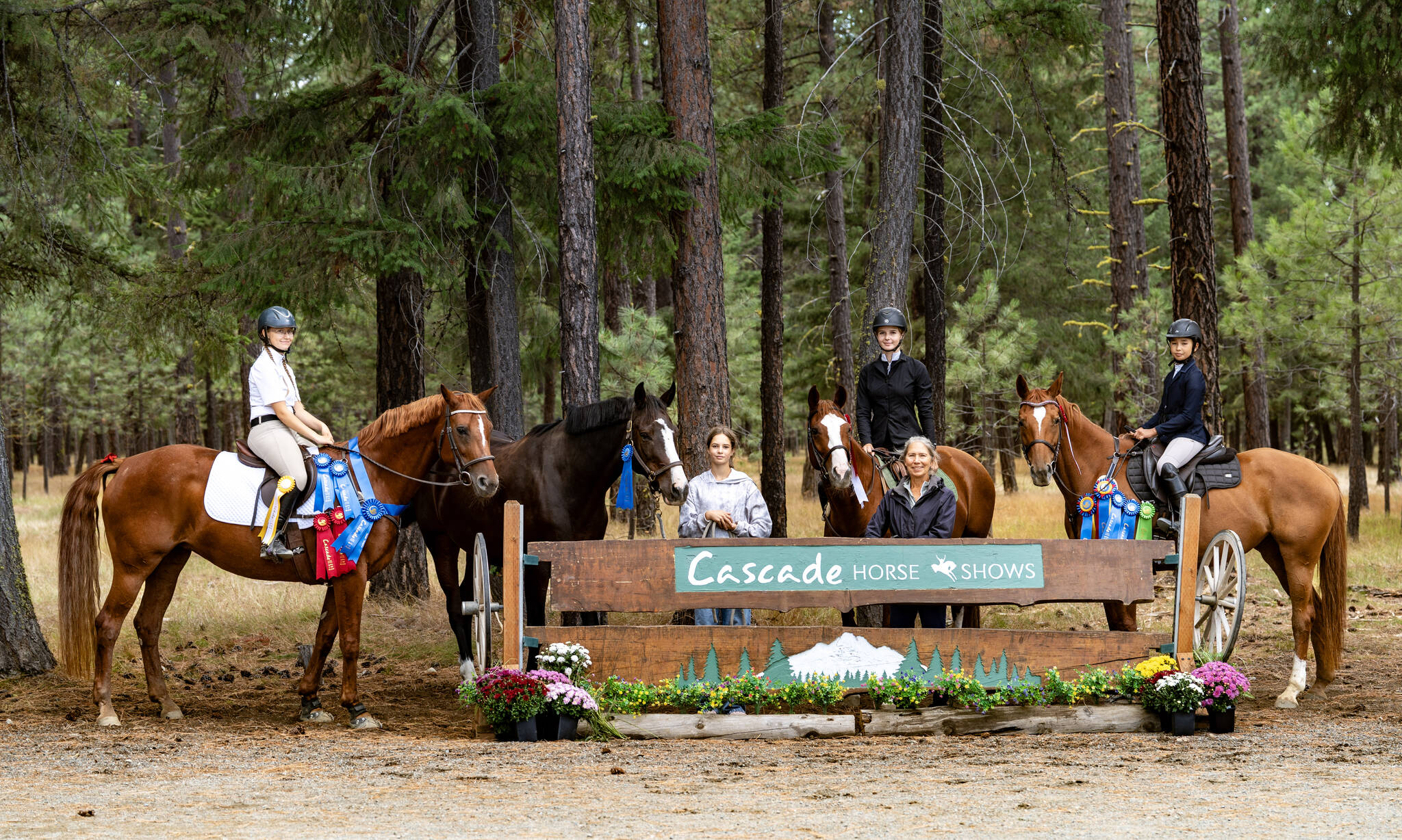 The Freedom Farm Hoof Beats competition team at the Cascade Horse Show in Cle Elum includes Lily Robertson on Ruby, left, Zeus with Daniella Dam, EllyAna Dam on Harriet, instructor Mary Gallagher and Isabella Greimes on Pixie. (Kimi Robertson)