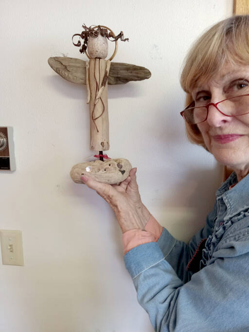 Candice Olsen displays one of the angels created for the Yuletide Bazaar at Dungeness Valley Lutheran Church. (Dungeness Valley Lutheran Church)