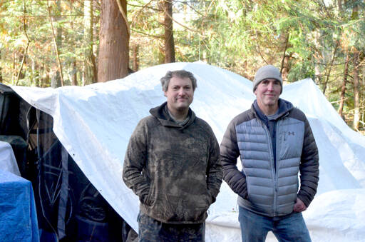Aaron Speer, left, a former resident of the DSHS encampment and Jefferson Healthcare hospital commissioner Matt Ready both received trespass warnings from the former encampment on Nov. 4. (Elijah Sussman/Peninsula Daily News)
