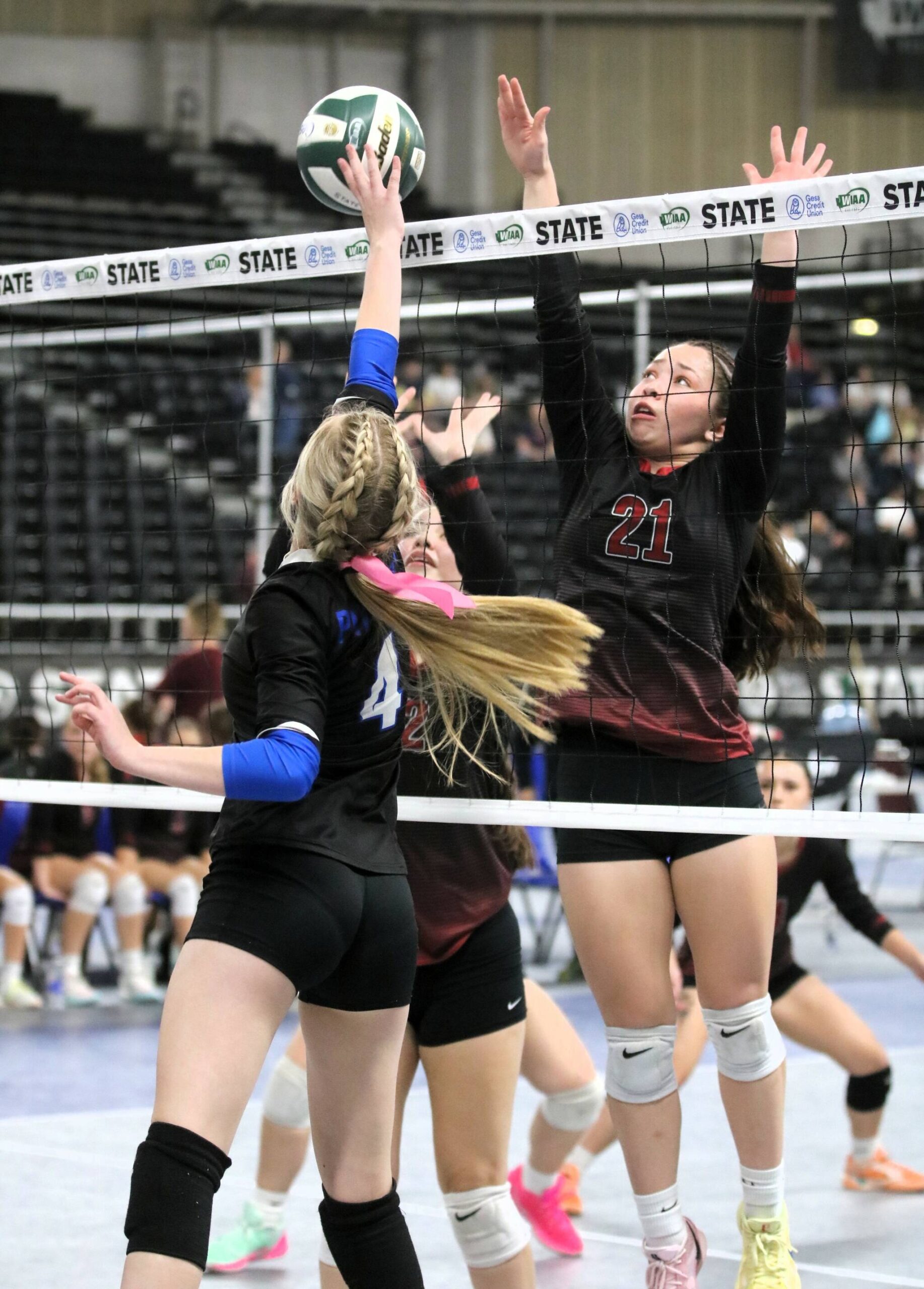 Brianna McGimpsey defends at the net during Neah Bay’s Class 1B state volleyball tournament contest against Valley Christian. Roger Harnack/Cheney Free Press