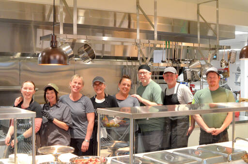 Garden Row Cafe staff in Jefferson Healthcare’s newly built kitchen, from the left: Aurora Kingslight, Shelly Perry, Aimee Smith, Michelle Poore, Teresa Schmidt, Jimmy Snyder, Arran Stark and Nick Collier. (Elijah Sussman/Peninsula Daily News)