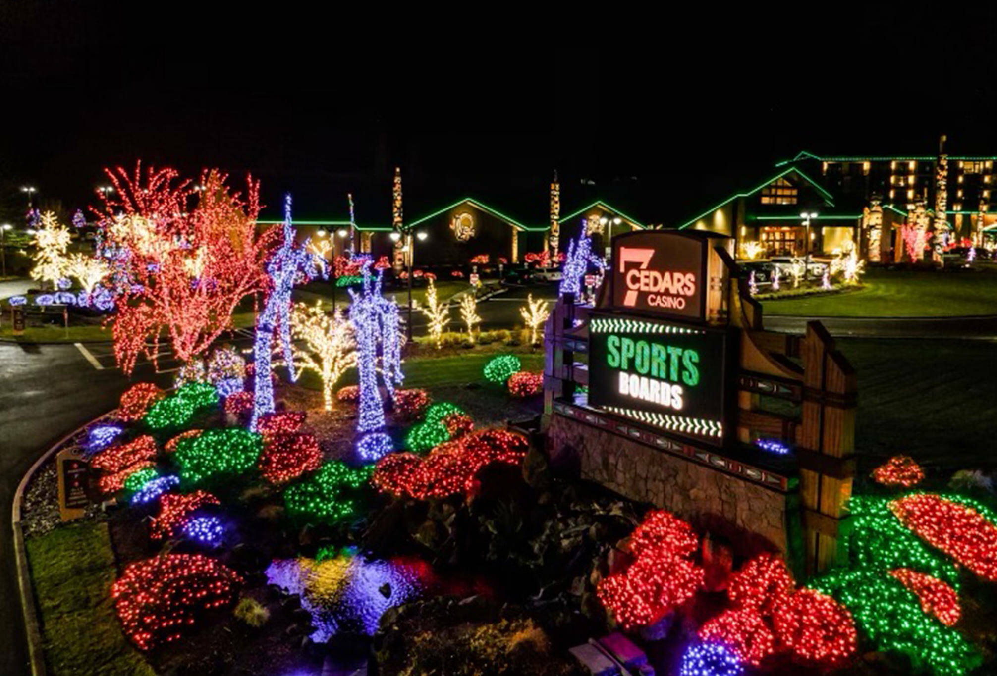 Every holiday season, crews string colorful Christmas lights on every shrub and tree at 7 Cedars and other Jamestown S’Klallam Tribe properties. (Patrick Walker/Olympic Peninsula News Group file)