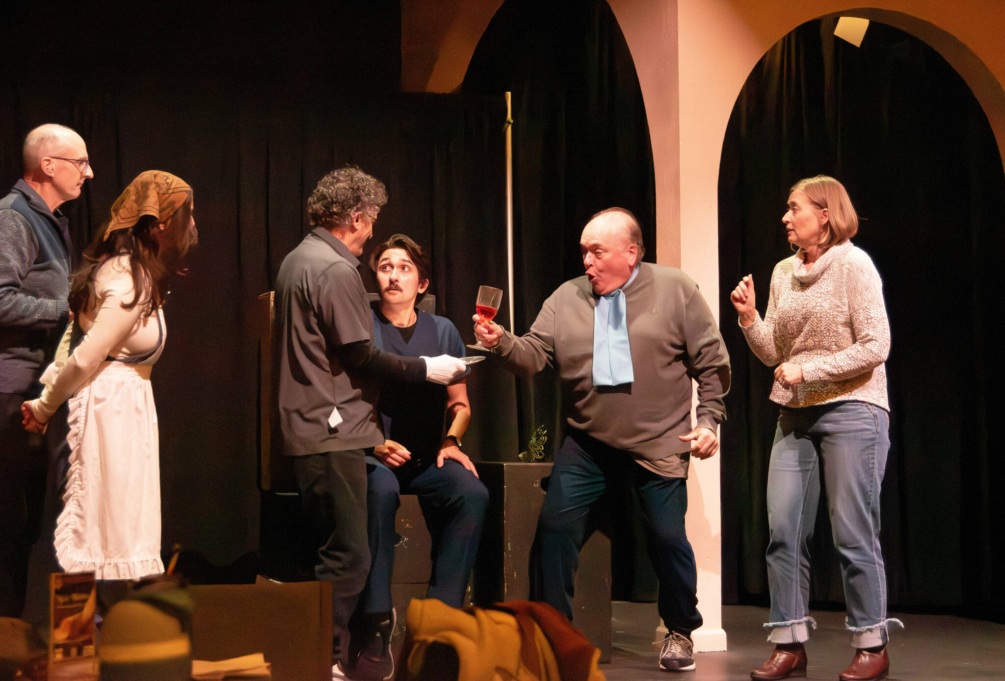 Director Bill Stone, far left, observes as the full cast of “Death Perception,” written by John Painter, rehearses the week before the launch of the New Works Showcase at Olympic Theatre Arts in Sequim. The cast is, from left, Veronica Konecnik, Jory Kahn, Simon Close, Joel Swenning and Rebecca Maberry. (Monica Berkseth)
