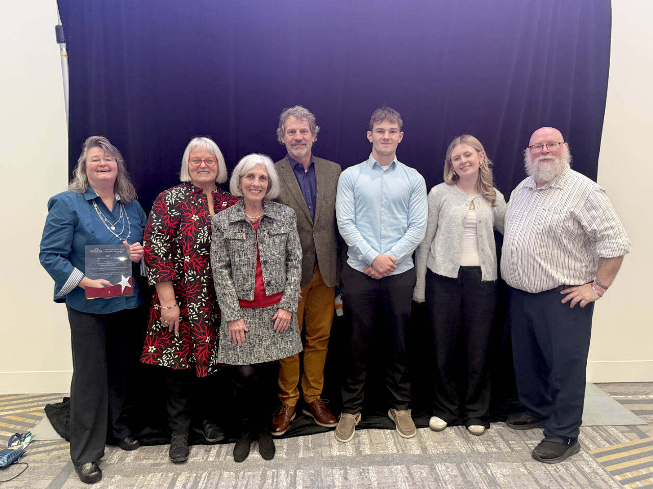 From left, Chimacum School Board directors Tami Robocker, Dr. Kristina Mayer, Kathryn Lanka, Superintendent, Dr. Scott Mauk, Student Director Ethan Perovich, Student Director Emily Liske and Board director Mike Aman. Roxanne Hudson is not pictured.