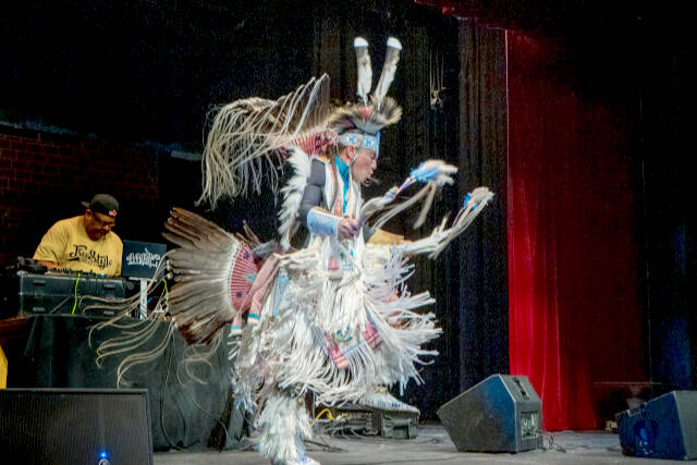 Steve Mullensky/for Peninsula Daily News
Supaman performs a "Men's War Dance" to a full house on Thursday at the Port Townsend High School auditorium. Supaman, whose real name is Christian Parrish Takes the Gun, is an Apsáalooke rapper and fancy war dancer who grew up in Crow Agency, Mont.