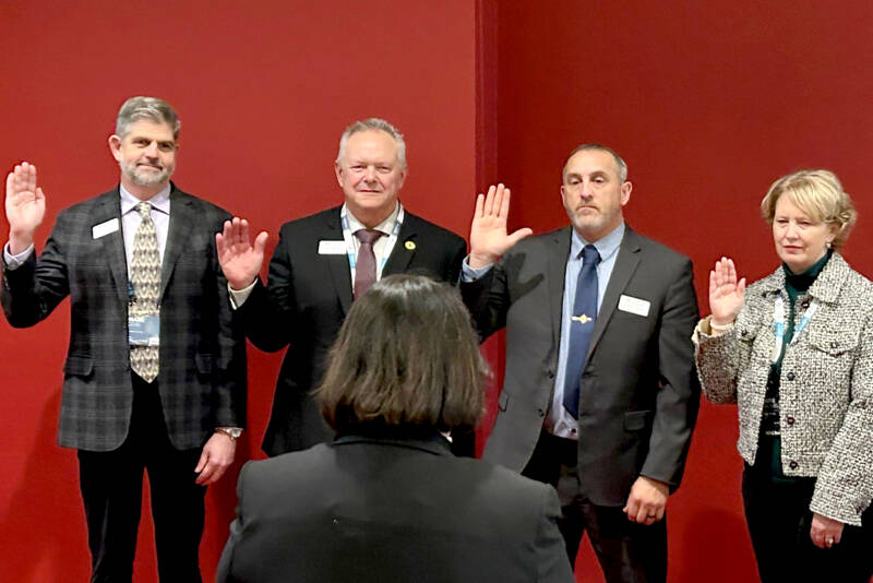 Clallam County Commissioner Mark Ozias, left, has been elected to serve as president of the Washington State Association of Counties for the coming year.