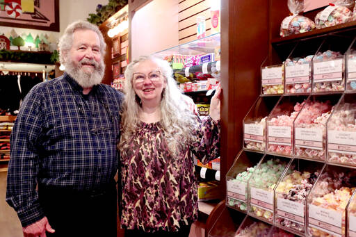 Bob and Lindi Lumens reopened Northwest Fudge & Confections in downtown Port Angeles earlier this month after a flood last January forced a nine-month closure. (Dave Logan/for Peninsula Daily News)