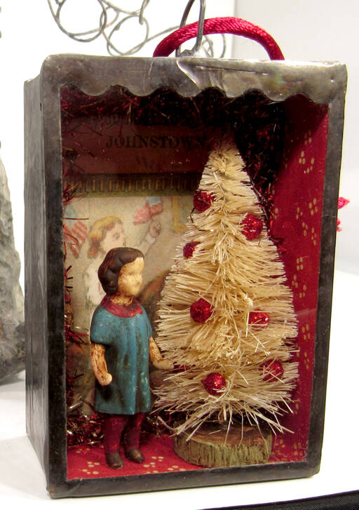 “Christmas Girl” by Jennifer Rose is part of the Blue Whole Gallery’s December exhibit, “A Silver Lining.”